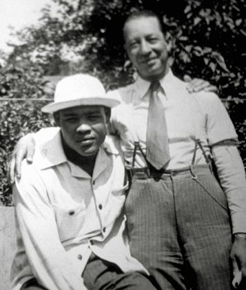 J.C. (right) with boxer Joe Louis